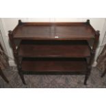 A Victorian mahogany three tier buffet on castors. 98cm H, 106cm W, 44cm D.