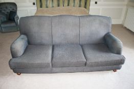 A Howard style contemporary three seat upholstered sofa, 88cm H, 195cm W,