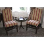 A pair of contemporary George II style upholstered dining chairs.