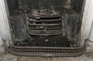 A Regency cut steel fire fender.