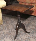 A George IV small mahogany tripod table.