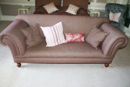 A contemporary early 19th century style flared arm upholstered three seat sofa, 88cm H, 215cm W,