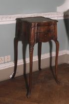 A Louis XVI serpentine plant stand/ table.