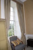 A pair of lined curtains with pelmet.