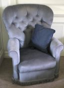 A 20th century Victorian style button back upholstered armchair, 97cm H, 74cm W,