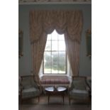 A pair of damask silk lined curtains and matching tasselled pelmet.