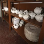 An assortment of approximately 20 teapots,