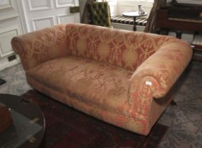 A contemporary 2 and 1/2 seat Chesterfield style sofa.