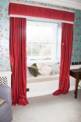 A pair of lined curtains and pelmet.