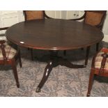 A 20th century oak Georgian style pedestal table. Tripod base, 71cm H x 129cm diameter.