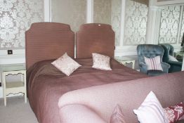 A patterned upholstered two part headboard, 114 H, 208 W, together with a two part Vi sprung bed,