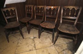 A set of five 19th century Gothic style Windsor chairs. 85cm H, 39cm W.