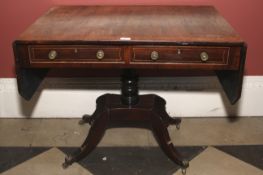A Regency rosewood pedestal sofa table.