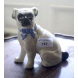 A Victorian style hand painted ceramic figure of a pug dog. 16cm H.