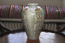 A large Denby style baluster shaped vase. Hand painted decoration, 35cm H.