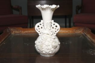 Belleck black Mark: a flared rim vase.