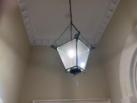 A circa 1900 brass and glass four glass inverted hall lantern with acanthus decoration