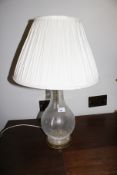 A contemporary cracked ice glass vase shaped table lamp, 65cm H,