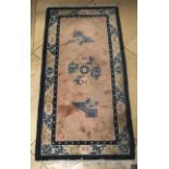 Two Chinese rugs. With beige and blue colours, one 140cm x 70cm, the other 155cm x 90cm.