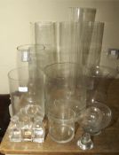 An assortment of large lily vases, vases,