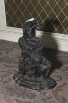 A cast iron doorstop in the form of Punch. 32cm H.