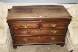 A late 18th century oak chest of drawers.