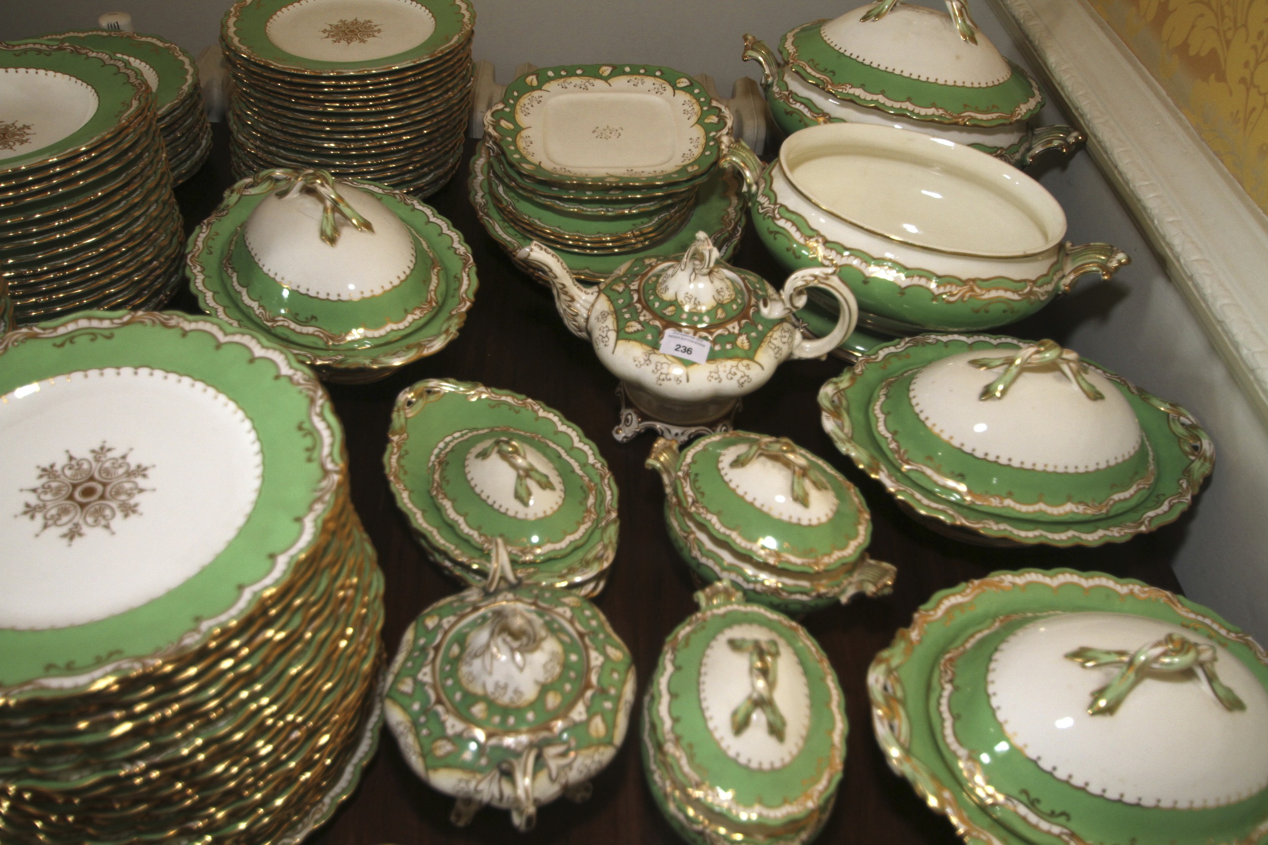 A Victorian Rockingham green gilt and cream large dinner service. - Image 2 of 2