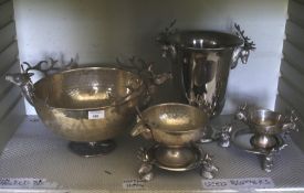 A collection of silver plate. To include stag ice bucket, punch bowls, cake stand, etc (7).