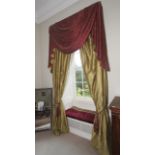 A pair of silk lined curtains with tassled pelmet, with green gold finish,