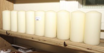 Nine assorted large church style candles