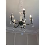 Three brushed bronze effect lights to include a pendant five branch ceiling electrolier with a pair