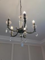 Three brushed bronze effect lights to include a pendant five branch ceiling electrolier with a pair