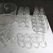 A large quantity of assorted wine glasses,