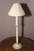 A contemporary painted wooden table lamp.