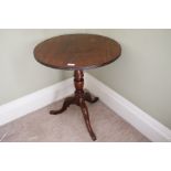 Circa 1900, a mahogany circular pedestal tripod table, 71cm H,