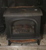 A contemporary cast iron electric stove type burner. 66cm H, 64cm W, 45cm D.