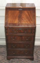 A 20th century mahogany full front bureau. With four graduated drawers, 100cm H, 51cm W, 45cm D.