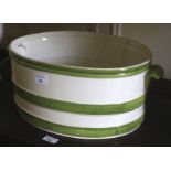 An Italian green and white foot bath. With hand painted banded decoration, 20cm H, 47cm W, 30cm D.