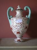 A late 18th/early 19th century English Staffordshire classical urn and cover.