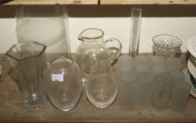 An assortment of frosted glasses for tea lamps etc and various vases,