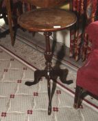 A 20th century mahogany pedestal wine table. With tripod legs, 65cm H, 37cm diameter.