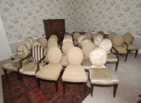 A collection of balloon backed upholstered dining chairs,