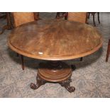 A Victorian walnut circular pedestal table. On four feet, 74cm H x 114cm diameter.