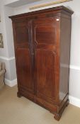 A 19th century mahogany two door wardrobe.