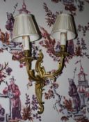 A pair of 20th century ormolou rogogo style wall lamps and stands