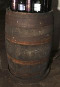 A full size coopered barrel with steel hoops
