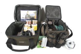 Two Fox tackle bags including camping equipment, carp baits and other accessories.