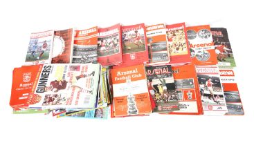 A collection of Arsenal football programmes.