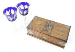An oak smoker's cigar box and a pair of blue flashed 'Bohemian' glass wine goblets
