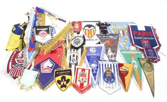 A collection of football pennants.